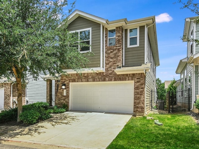 2211 Capulet St, Austin, TX 78741 - view of front of house featuring a garage, brick siding, cooling unit, and driveway
