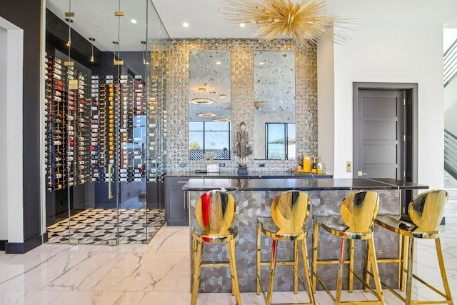 12885 Park Dr, Austin, TX 78732 - wine cellar featuring marble finish flooring and recessed lighting