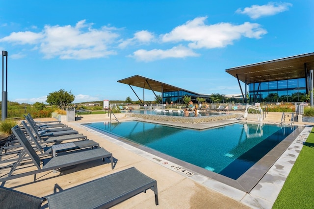 view of pool with a patio area