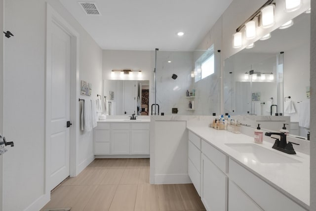 bathroom with vanity and walk in shower