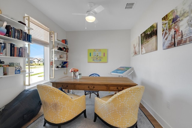 office area with ceiling fan