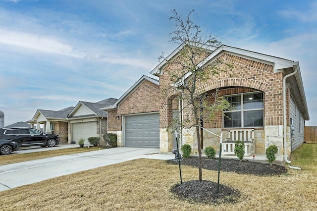 view of front of home with a garage and a front yard