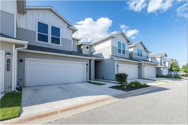 townhome / multi-family property featuring a garage