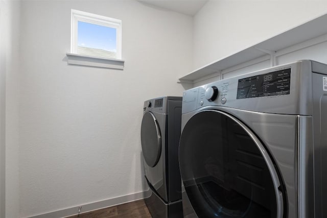 116 Big Cypress Bayou Rd, Hutto, TX 78634 - washroom featuring independent washer and dryer, baseboards, and dark wood-style floors