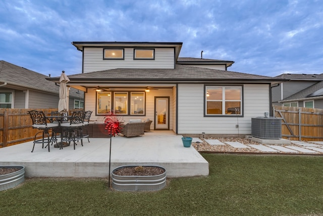 116 Big Cypress Bayou Rd, Hutto, TX 78634 - rear view of house with central AC unit, a ceiling fan, a patio area, outdoor lounge area, and roof with shingles