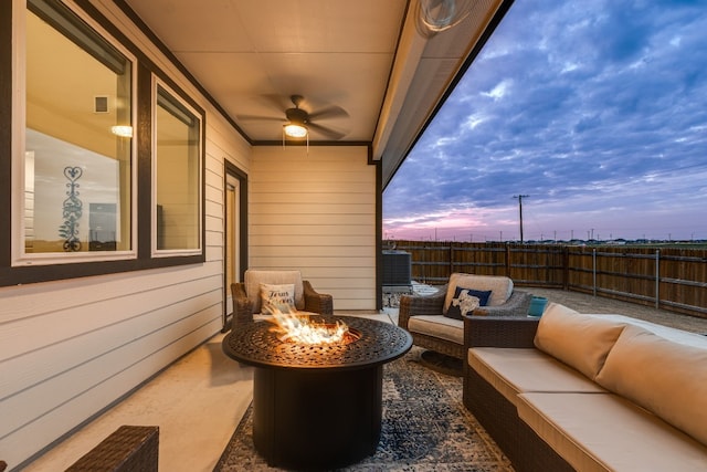 116 Big Cypress Bayou Rd, Hutto, TX 78634 - view of patio / terrace with an outdoor living space with a fire pit, a ceiling fan, and central AC