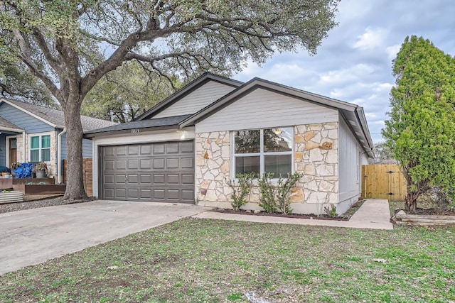 ranch-style home with a garage