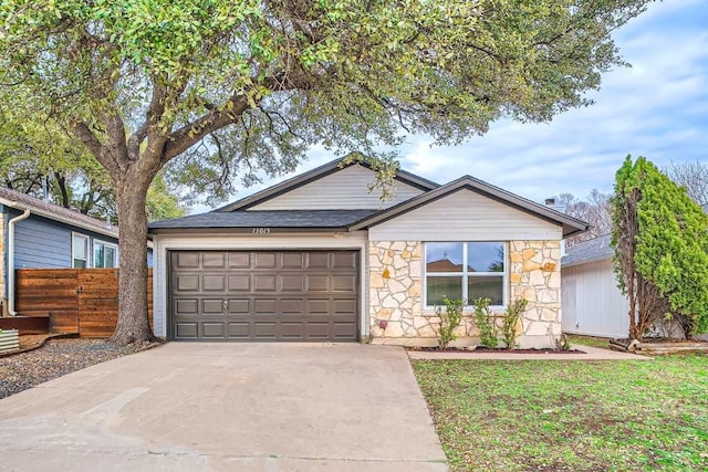 ranch-style home with a garage