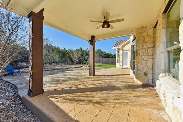 view of patio / terrace featuring ceiling fan