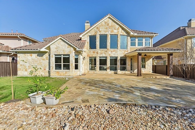 rear view of property with a patio