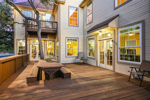 wooden deck featuring french doors