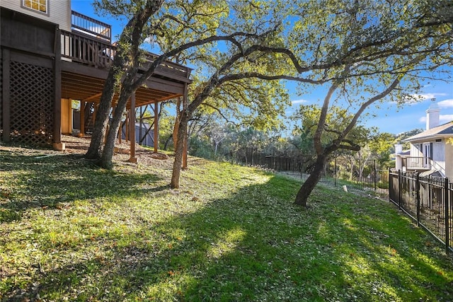 view of yard with a wooden deck