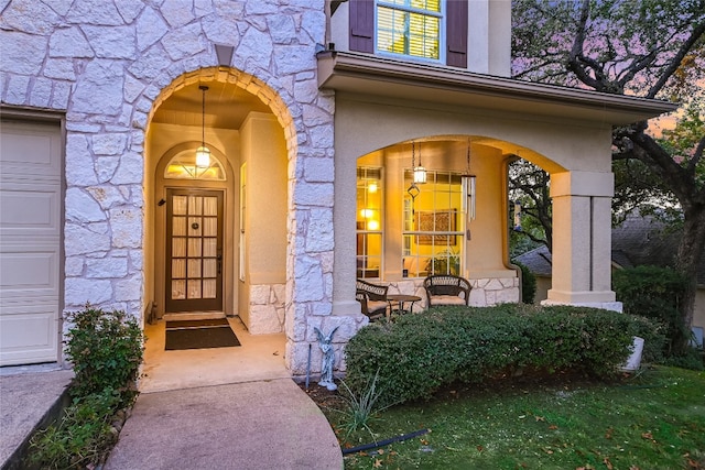 property entrance featuring a garage