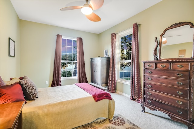 bedroom featuring ceiling fan and carpet flooring