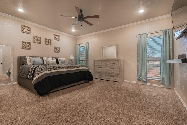 bedroom with crown molding, ceiling fan, carpet, and a textured ceiling