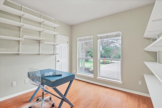 136 Clubhouse Dr, Lakeway, TX 78734 - office with baseboards and wood finished floors