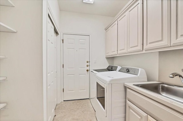 136 Clubhouse Dr, Lakeway, TX 78734 - laundry area with separate washer and dryer and cabinet space