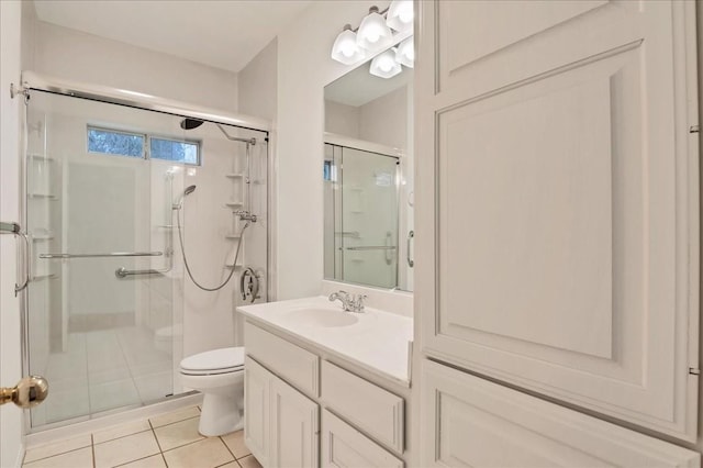 136 Clubhouse Dr, Lakeway, TX 78734 - bathroom with a shower stall, tile patterned flooring, and vanity