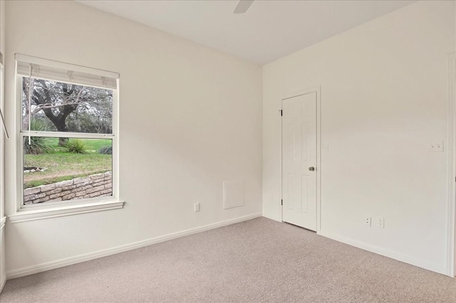136 Clubhouse Dr, Lakeway, TX 78734 - carpeted empty room with baseboards