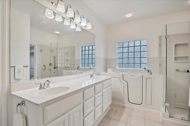 136 Clubhouse Dr, Lakeway, TX 78734 - full bathroom with a stall shower, a bath, tile patterned flooring, and double vanity