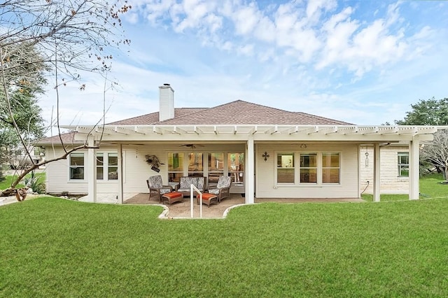 rear view of property with a patio, outdoor lounge area, and a lawn