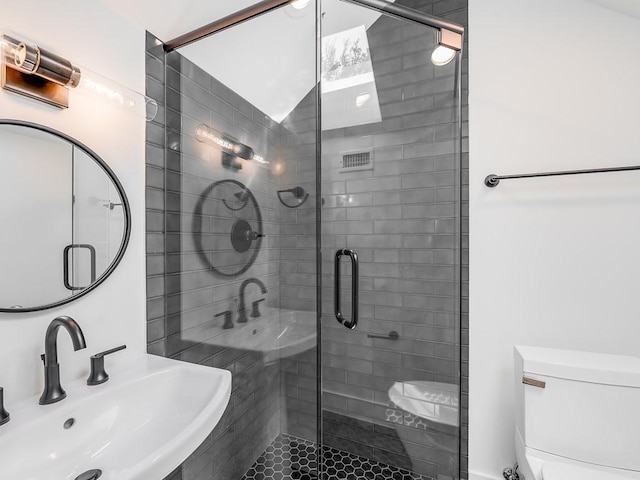 2903 E 14th St Unit 1, Austin, TX 78702 - bathroom with a sink, toilet, and a stall shower
