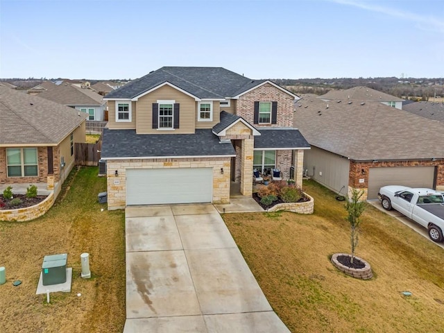 2221 Clove Ct, Temple, TX 76501 - view of front facade featuring a garage and a front yard
