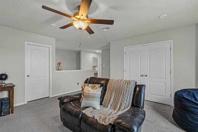 2221 Clove Ct, Temple, TX 76501 - carpeted living room with ceiling fan
