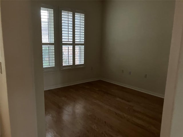103 Wild Rose Dr, Georgetown, TX 78633 - unfurnished room with wood finished floors and baseboards