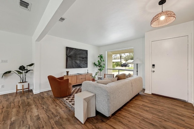 living room with dark wood-type flooring