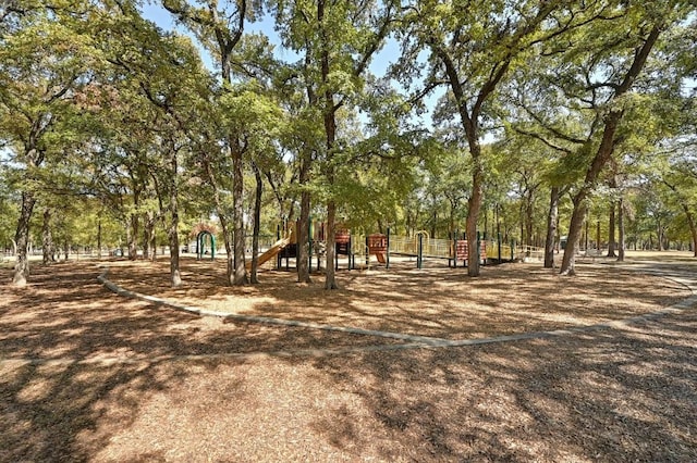 view of home's community featuring a playground