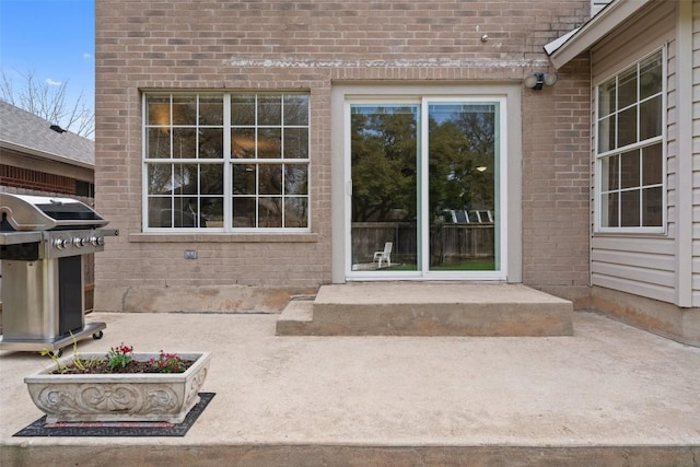 doorway to property with a patio