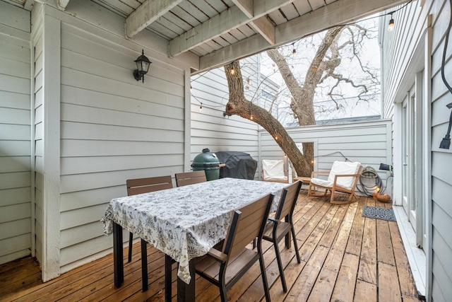 wooden terrace featuring grilling area