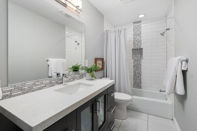 full bathroom with tasteful backsplash, tile patterned flooring, toilet, shower / bathtub combination with curtain, and vanity