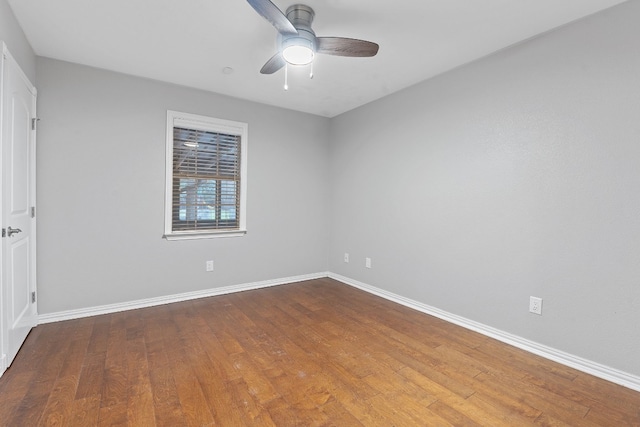 unfurnished room with wood-type flooring and ceiling fan