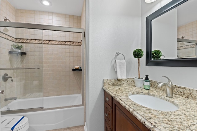 1526 Shenandoah Dr, Cedar Park, TX 78613 - full bathroom with vanity, bath / shower combo with glass door, toilet, and recessed lighting