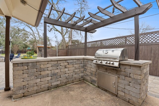 1526 Shenandoah Dr, Cedar Park, TX 78613 - fenced backyard with an outdoor kitchen, a pergola, and a patio area