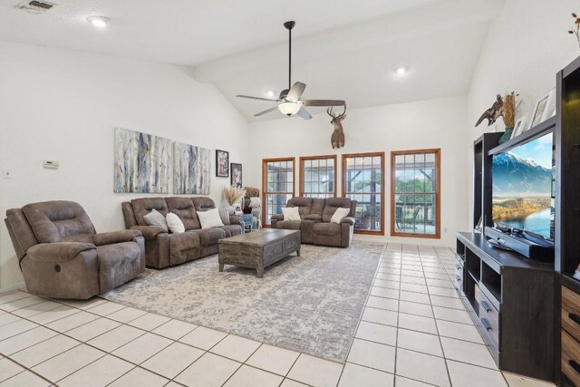 living room featuring visible vents, beamed ceiling, high vaulted ceiling, light tile patterned floors, and ceiling fan