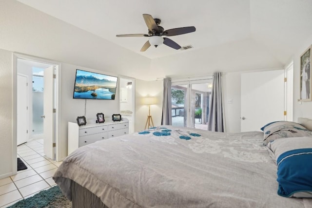 bedroom featuring visible vents, connected bathroom, light tile patterned floors, lofted ceiling, and ceiling fan