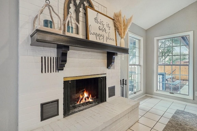 interior details featuring visible vents and a fireplace