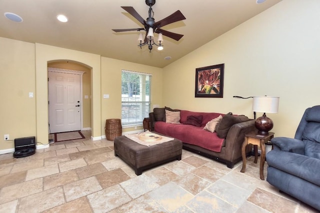 living room with lofted ceiling and ceiling fan