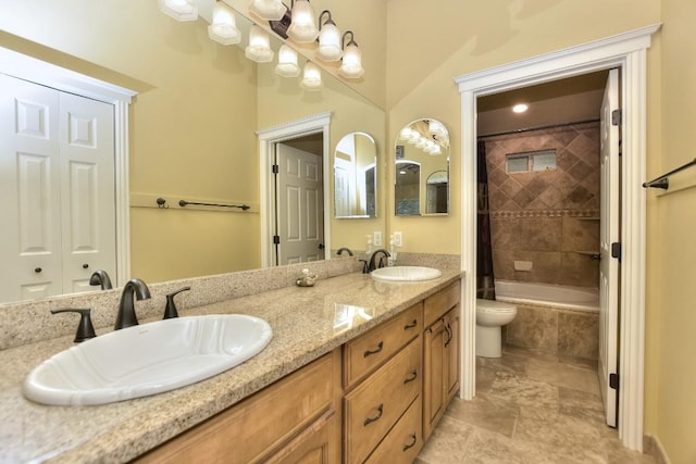 bathroom with shower / bathtub combination with curtain and vanity