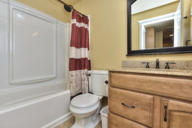 full bathroom featuring vanity, shower / bathtub combination with curtain, and toilet