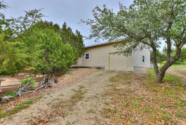 view of home's exterior with a garage