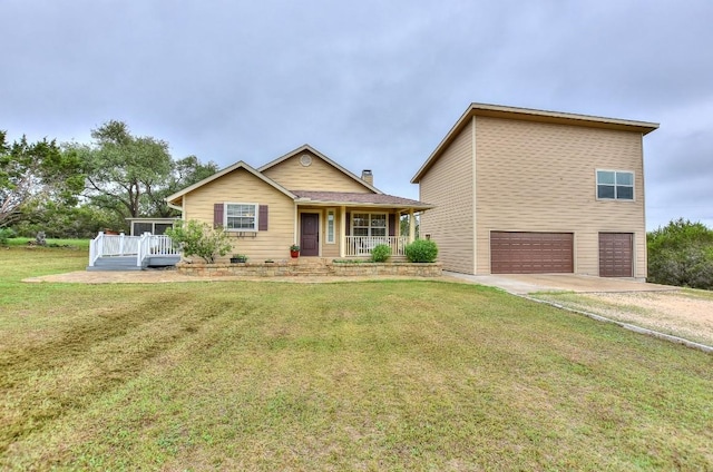 view of front of home with a porch, a garage, and a front yard