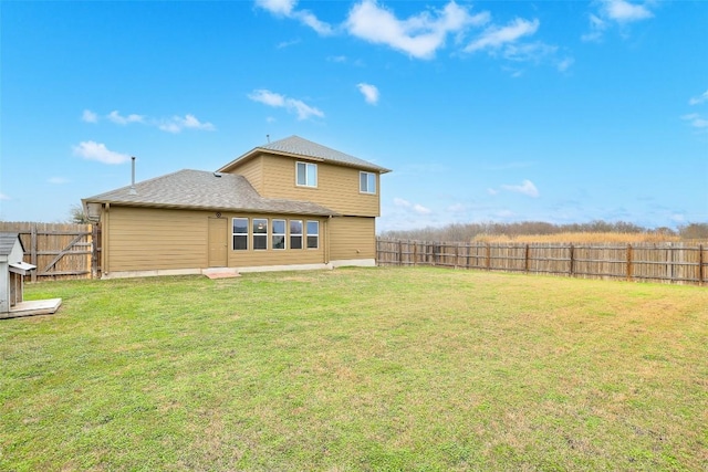 218 Cloud Rd, Hutto, TX 78634 - rear view of property with a shingled roof