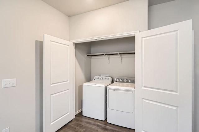 10801 Dimitrios Dr, Austin, TX 78747 - laundry area with washing machine and clothes dryer and dark wood-style flooring