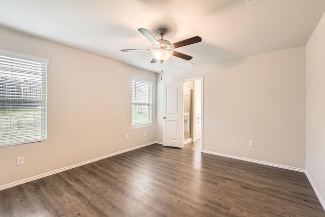 10801 Dimitrios Dr, Austin, TX 78747 - unfurnished room with ceiling fan and dark wood finished floors