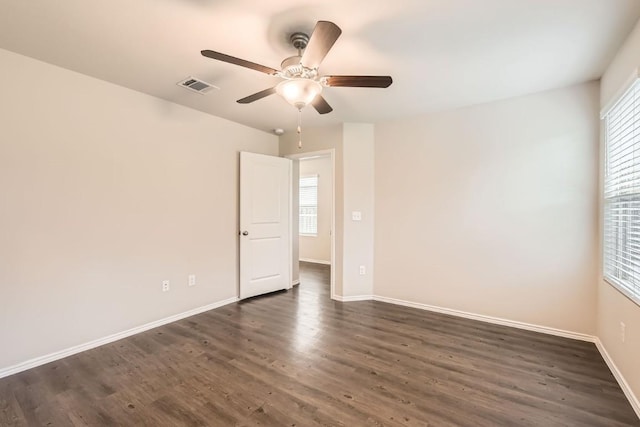 10801 Dimitrios Dr, Austin, TX 78747 - unfurnished room with ceiling fan and dark wood-type flooring