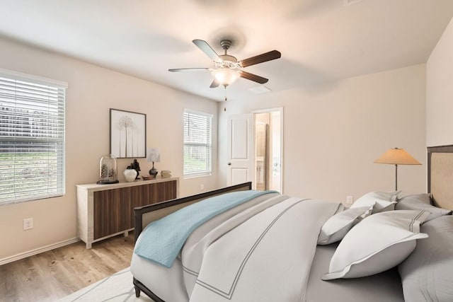 10801 Dimitrios Dr, Austin, TX 78747 - bedroom with wood finished floors and a ceiling fan